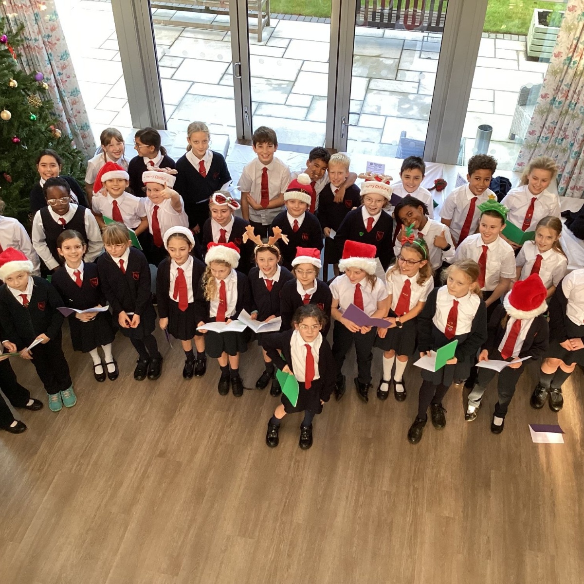 Cardinal Newman Catholic Primary School - Carol singing at Walton Park ...